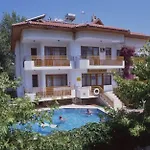üstün
